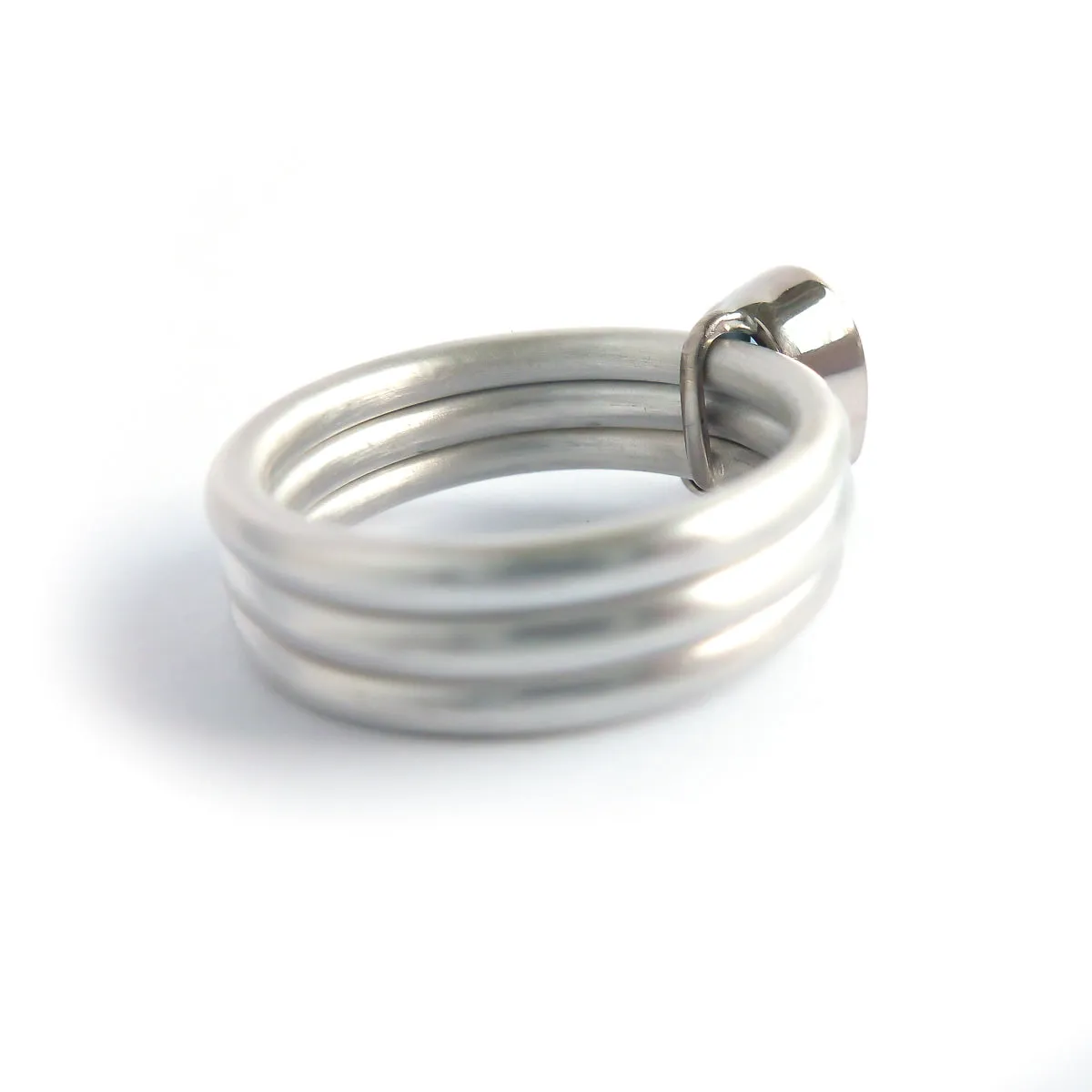 A unique, contemporary aquamarine and diamond gold and silver ring