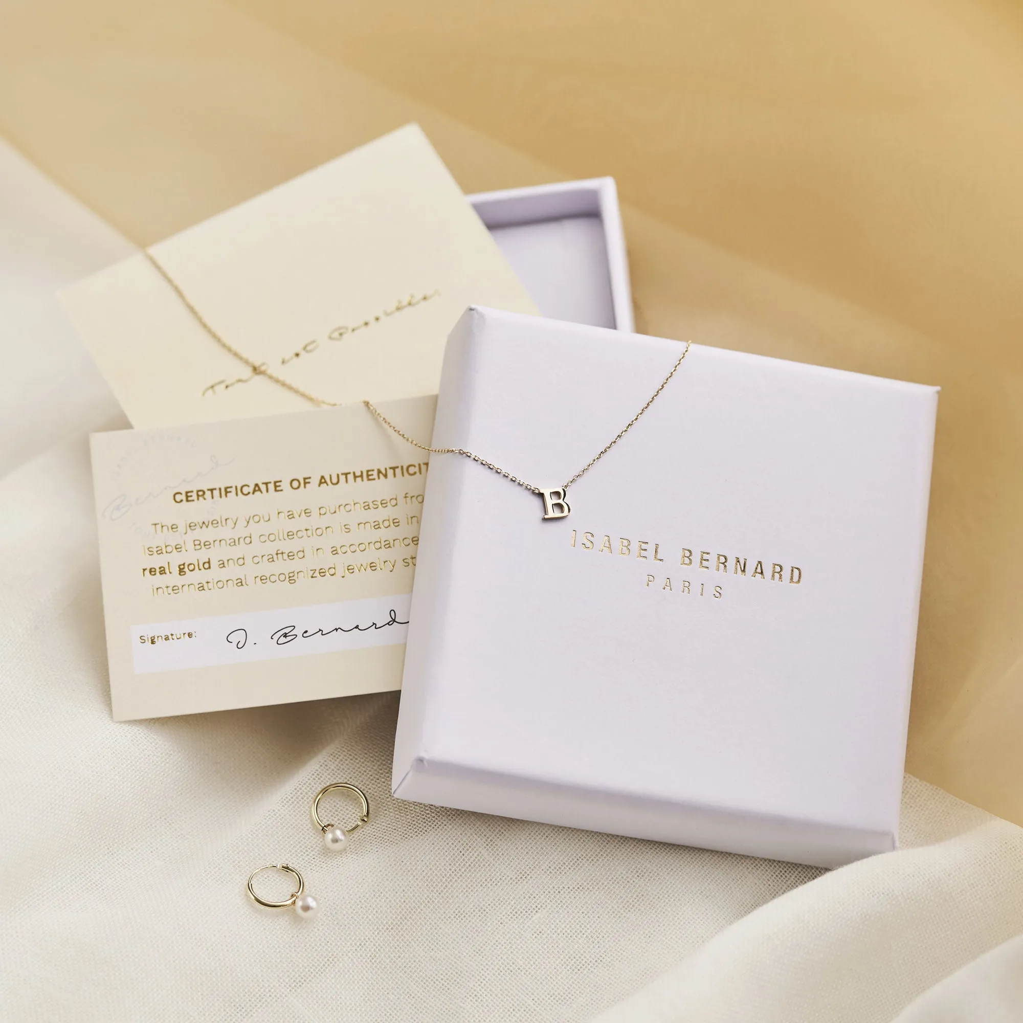 Saint Germain Felie 14 karat white gold cube charm with zirconia stone
